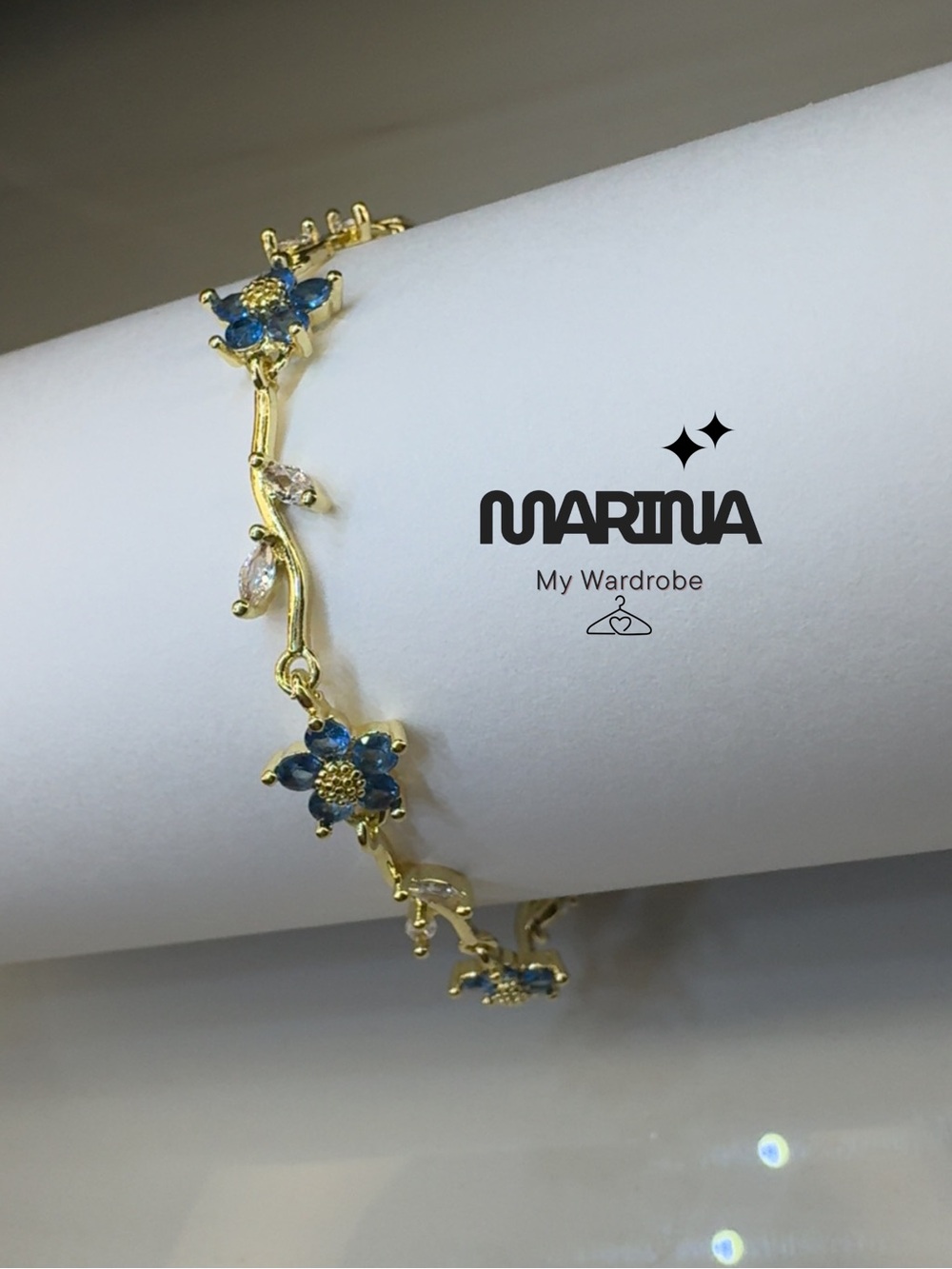 MARINA Gold-Tone Bracelet with Blue Flower Accents